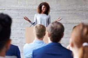 Motivational speaker in front of an audience