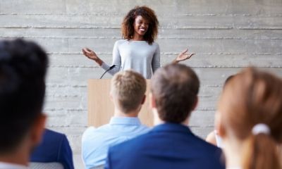 Motivational speaker in front of an audience